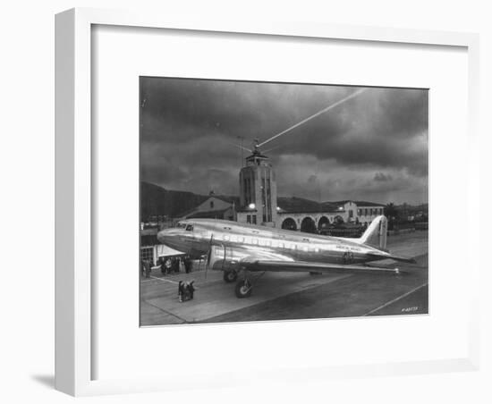 Beacon Shining Forth at Evening from Air Terminal Tower, American Airlines Plane in Foreground-null-Framed Premium Photographic Print