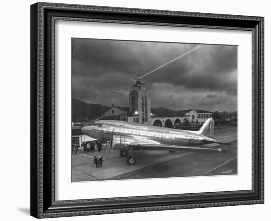 Beacon Shining Forth at Evening from Air Terminal Tower, American Airlines Plane in Foreground-null-Framed Premium Photographic Print