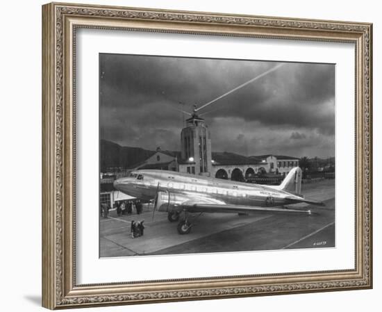 Beacon Shining Forth at Evening from Air Terminal Tower, American Airlines Plane in Foreground-null-Framed Photographic Print