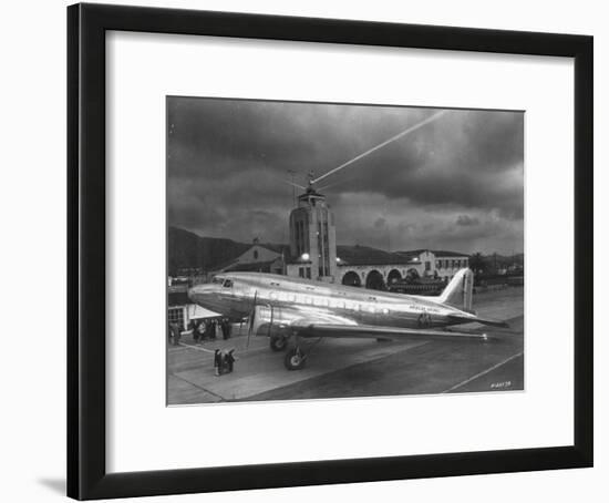 Beacon Shining Forth at Evening from Air Terminal Tower, American Airlines Plane in Foreground-null-Framed Photographic Print