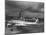 Beacon Shining Forth at Evening from Air Terminal Tower, American Airlines Plane in Foreground-null-Mounted Photographic Print