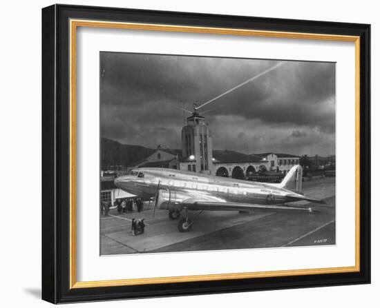 Beacon Shining Forth at Evening from Air Terminal Tower, American Airlines Plane in Foreground-null-Framed Photographic Print