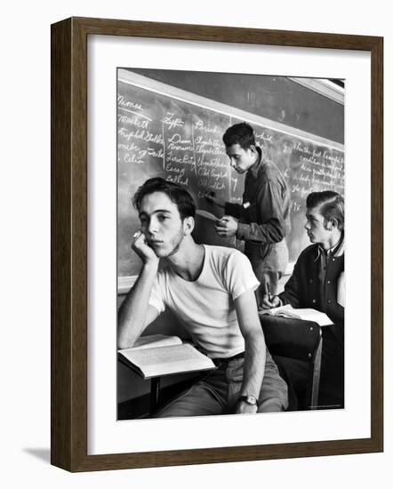 Beard Started on Teenage High School Student as Others Work on Lessons at blackboard and desk-Alfred Eisenstaedt-Framed Photographic Print