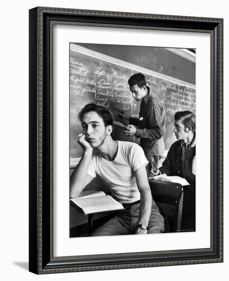 Beard Started on Teenage High School Student as Others Work on Lessons at blackboard and desk-Alfred Eisenstaedt-Framed Photographic Print