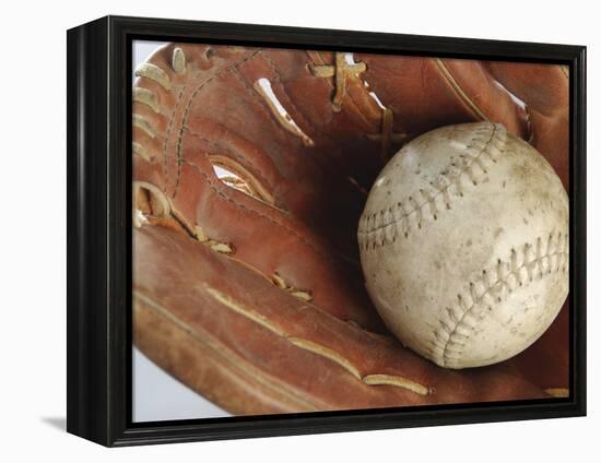 Beaten-Up Baseball in Baseball Glove-null-Framed Premier Image Canvas