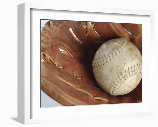 Beaten-Up Baseball in Baseball Glove-null-Framed Photographic Print