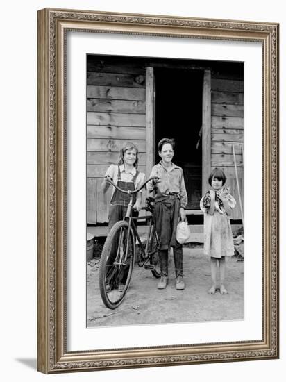 Beautiful Children with Bike and a Cat-Dorothea Lange-Framed Art Print