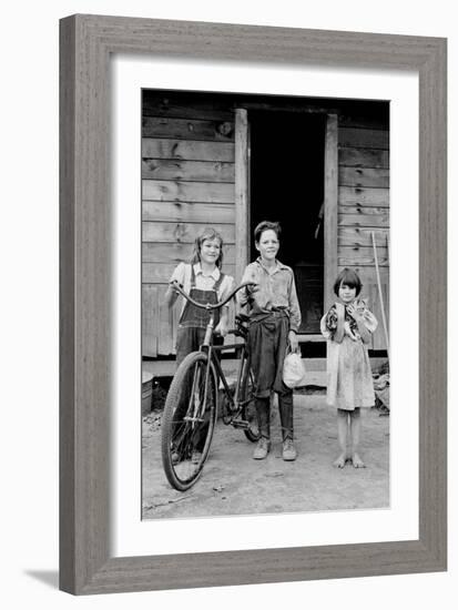 Beautiful Children with Bike and a Cat-Dorothea Lange-Framed Art Print