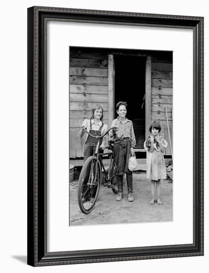 Beautiful Children with Bike and a Cat-Dorothea Lange-Framed Art Print