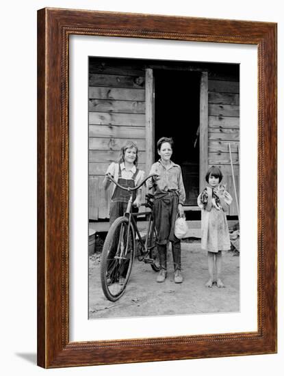 Beautiful Children with Bike and a Cat-Dorothea Lange-Framed Art Print