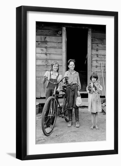 Beautiful Children with Bike and a Cat-Dorothea Lange-Framed Art Print