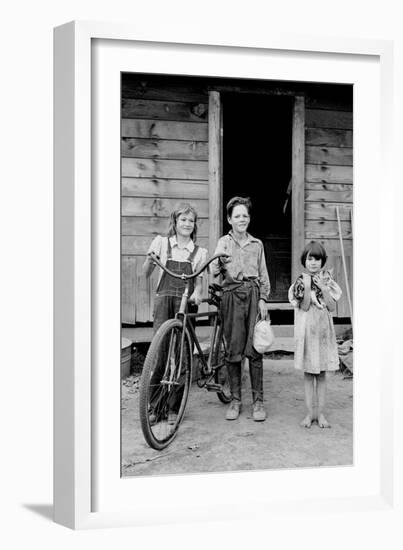 Beautiful Children with Bike and a Cat-Dorothea Lange-Framed Art Print