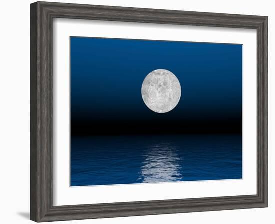 Beautiful Full Moon Against a Deep Blue Sky over the Ocean-null-Framed Art Print