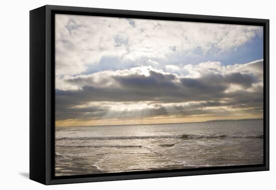 Beautiful Inspirational Sunset over English Coastal Landscape with Sun Bemsn Penetrating Moody Clou-Veneratio-Framed Premier Image Canvas