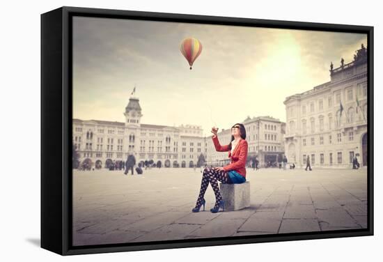 Beautiful Woman In Colored Clothes On A Square With Hot-Air Balloon In The Background-olly2-Framed Stretched Canvas