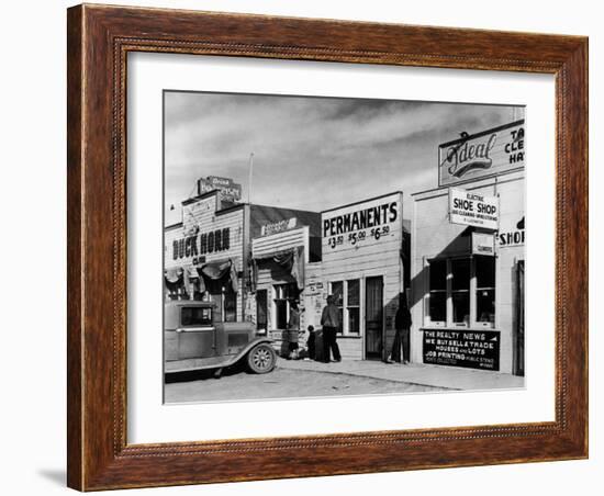 Beauty Parlor Advertising: Permanents: $3.50, $5.00 and $6.50, Shack Town, Fort Peck Dam-Margaret Bourke-White-Framed Photographic Print