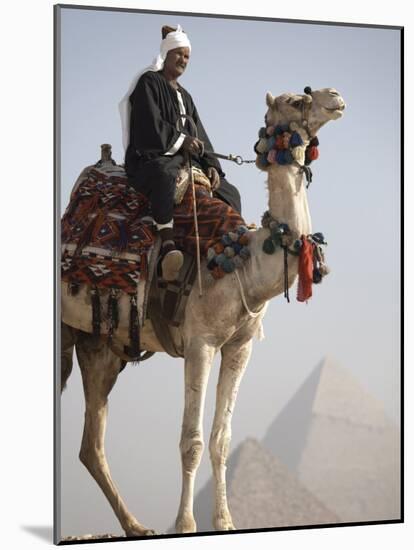 Bedouin Guide on Camel-Back Overlooking the Pyramids of Giza, Cairo, Egypt-Mcconnell Andrew-Mounted Photographic Print