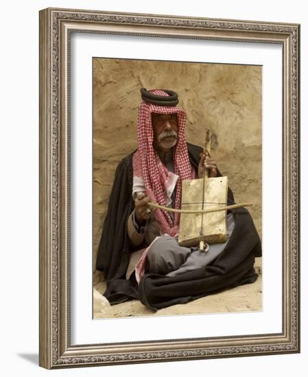 Bedouin Man in Traditional Dress Playing a Musical Instrument, Beida, Jordan, Middle East-Sergio Pitamitz-Framed Photographic Print