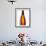 Beer Frothing Out of Bottle-Kröger & Gross-Framed Photographic Print displayed on a wall