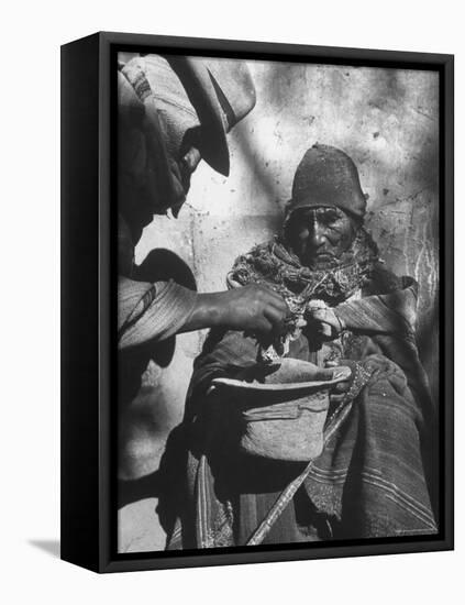 Beggar Being Given Coca Leaves-Eliot Elisofon-Framed Premier Image Canvas