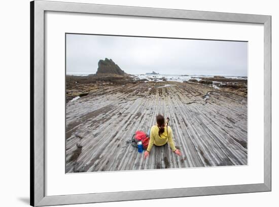 Bekah Herndon Sits On Rock Formations During Hike On Rialto Beach In The Olympic NP In Washington-Ben Herndon-Framed Photographic Print