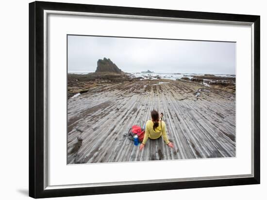 Bekah Herndon Sits On Rock Formations During Hike On Rialto Beach In The Olympic NP In Washington-Ben Herndon-Framed Photographic Print