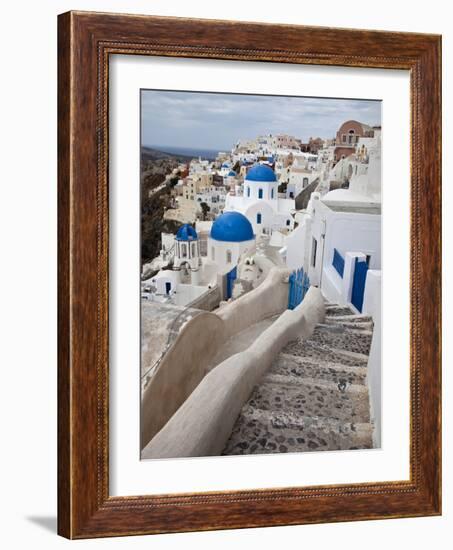 Bell Tower and Blue Domes of Church in Village of Oia, Santorini, Greece-Darrell Gulin-Framed Photographic Print