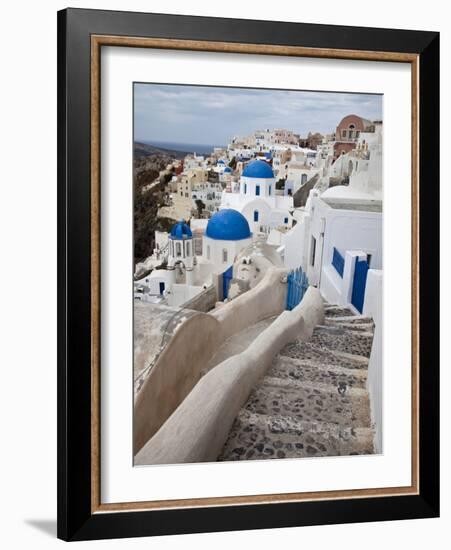 Bell Tower and Blue Domes of Church in Village of Oia, Santorini, Greece-Darrell Gulin-Framed Photographic Print