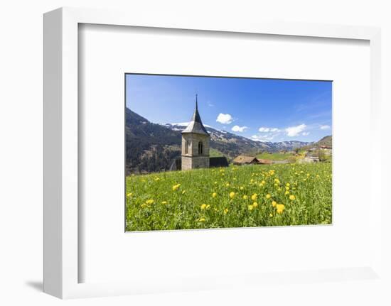 Bell tower surrounded by wildflowers and meadows in spring, Luzein, Switzerland-Roberto Moiola-Framed Photographic Print