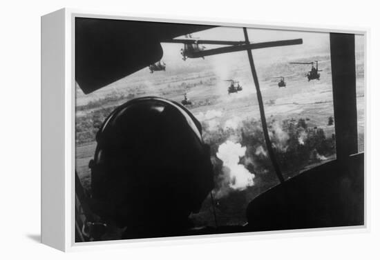 Bell Uh-1 Huey Squadron Firing on Vietcong-Dirck Halstead-Framed Premier Image Canvas