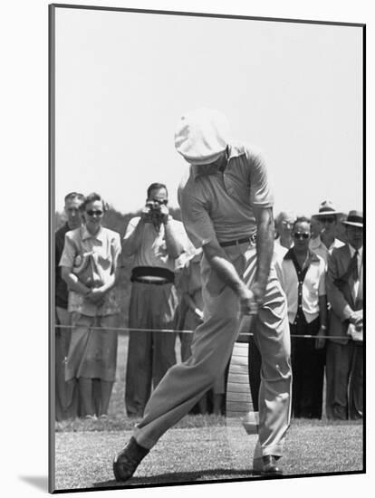 Ben Hogan Hitting a Golf Ball-John Dominis-Mounted Premium Photographic Print
