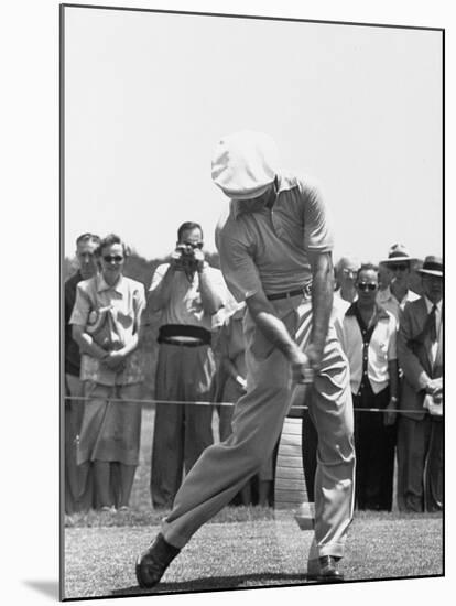 Ben Hogan Hitting a Golf Ball-John Dominis-Mounted Premium Photographic Print