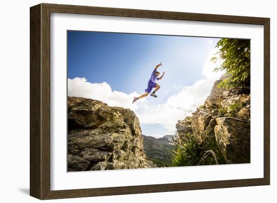 Ben Rueck Catches Some Air During A High Mountain Trail Run Just Outside Marble, CO-Dan Holz-Framed Photographic Print