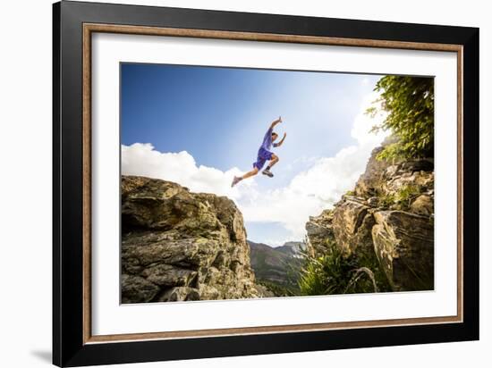 Ben Rueck Catches Some Air During A High Mountain Trail Run Just Outside Marble, CO-Dan Holz-Framed Photographic Print
