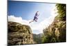 Ben Rueck Catches Some Air During A High Mountain Trail Run Just Outside Marble, CO-Dan Holz-Mounted Photographic Print