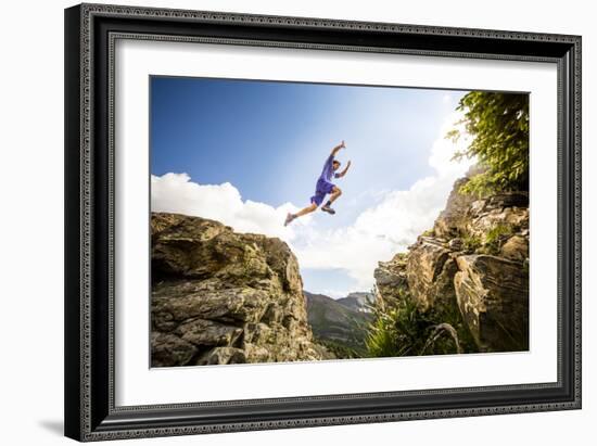 Ben Rueck Catches Some Air During A High Mountain Trail Run Just Outside Marble, CO-Dan Holz-Framed Photographic Print