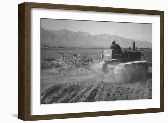 Benji Iguchi Driving Tractor in Field-Ansel Adams-Framed Art Print