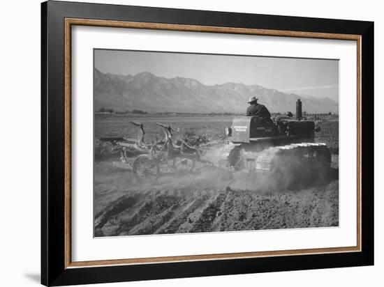 Benji Iguchi Driving Tractor in Field-Ansel Adams-Framed Art Print