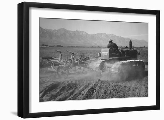 Benji Iguchi Driving Tractor in Field-Ansel Adams-Framed Art Print