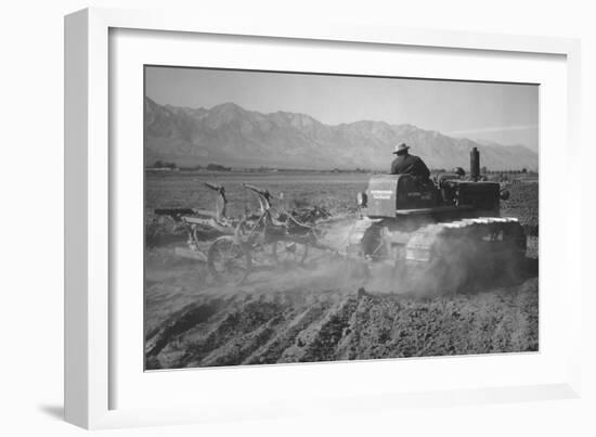 Benji Iguchi Driving Tractor in Field-Ansel Adams-Framed Art Print