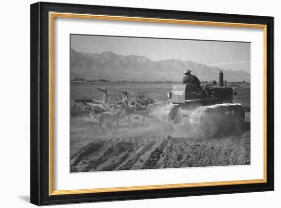 Benji Iguchi Driving Tractor in Field-Ansel Adams-Framed Art Print