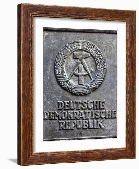 Berlin, Germany. Section of the Berlin Wall with the seal of the German Democratic Republic-Miva Stock-Framed Photographic Print