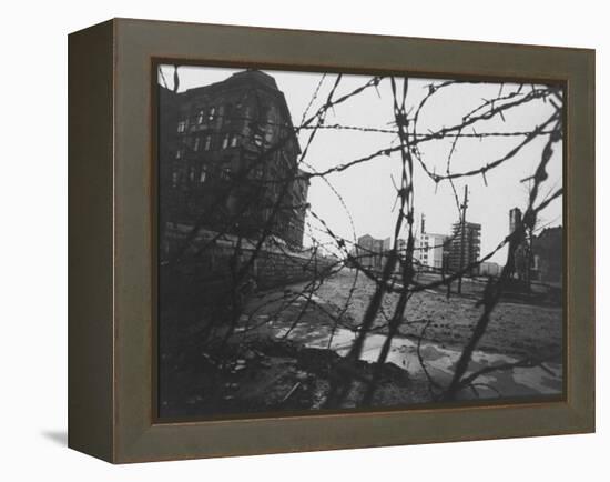 Berlin Wall Stretches Divisionally Between Buildings That Were Once on Common Ground-Paul Schutzer-Framed Premier Image Canvas