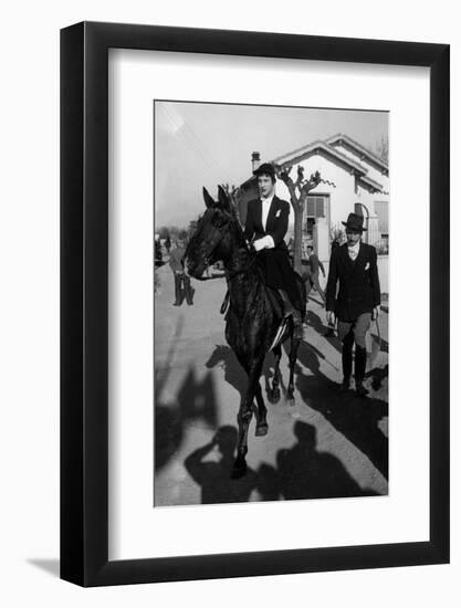 Bernadette Lafont as a young woman (16) on horse in Nimes, France, 1954 (b/w photo)-null-Framed Photo