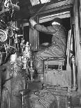 Santa Fe Railroad Dispatcher Working on a Freight Train-Bernard Hoffman-Photographic Print