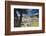 Bernina Express train runs past the village of St. Moritz surrounded by lake, Canton of Graubunden,-Roberto Moiola-Framed Premium Photographic Print