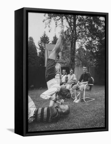 Berta de Fazio Eating Ice Cream from Reb Moore's Mouth in a Handstand-Joe Scherschel-Framed Premier Image Canvas