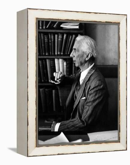 Bertrand Russell Sitting at His Desk at California University at Los Angeles-Peter Stackpole-Framed Premier Image Canvas