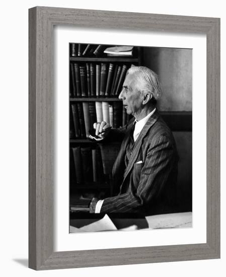 Bertrand Russell Sitting at His Desk at California University at Los Angeles-Peter Stackpole-Framed Photographic Print