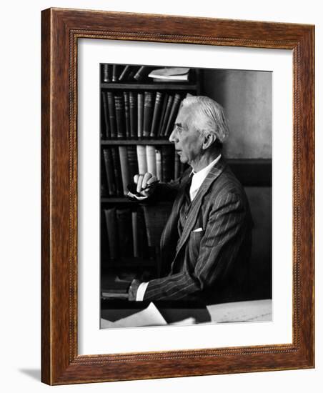 Bertrand Russell Sitting at His Desk at California University at Los Angeles-Peter Stackpole-Framed Photographic Print